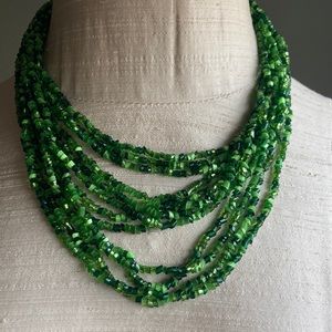 Vintage green multi strand beaded necklace with length adjustment.